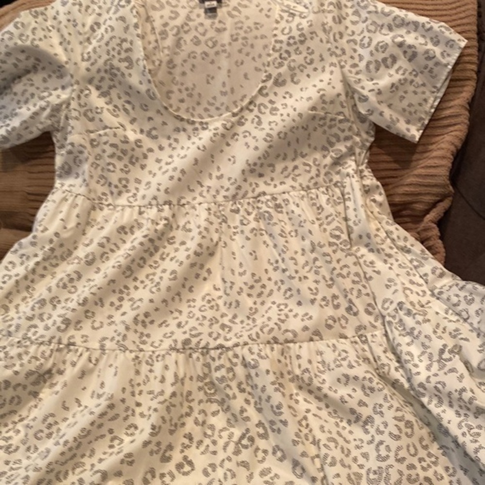 White with black dotted animal print accents